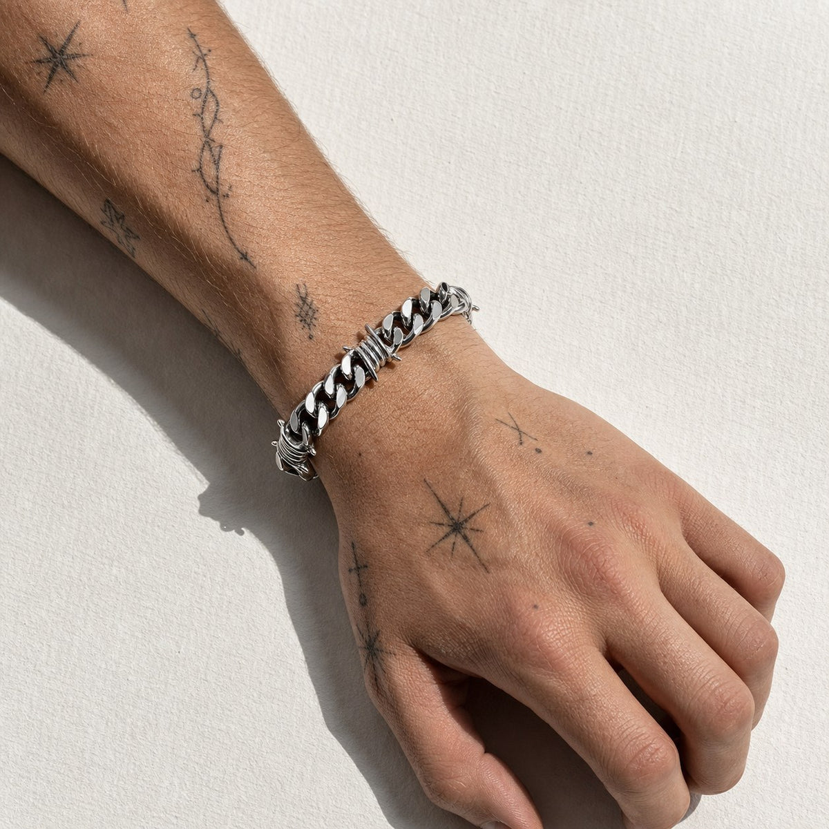 Stainless Steel Thorn Cuban Link Bracelet worn — Drokt